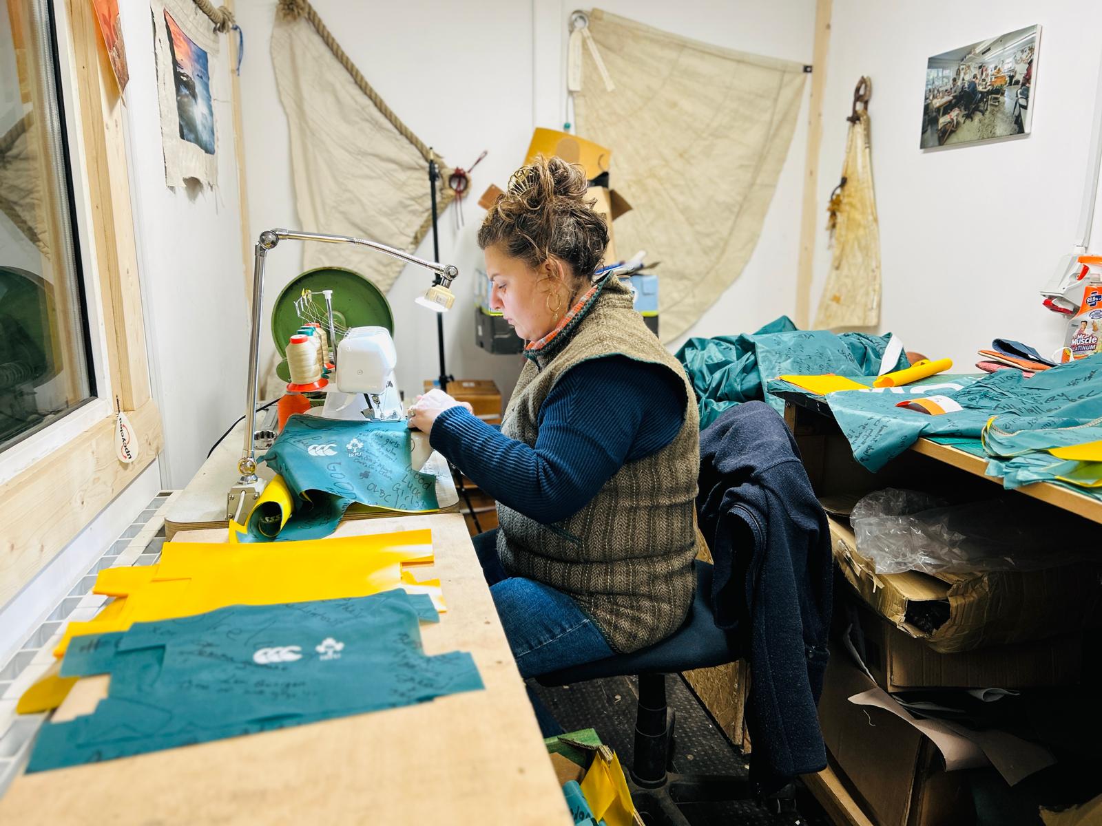 Nora stitching the signed jersey material in Mamukko’s Kinsale workshop